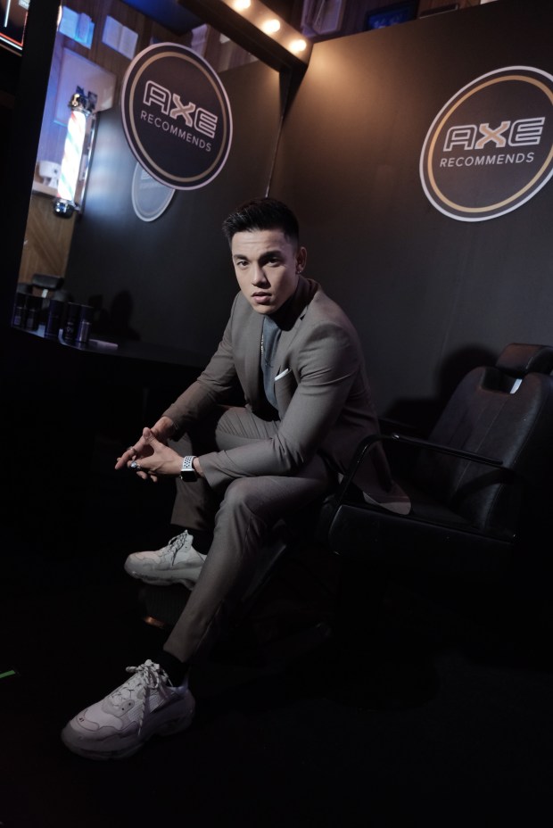 Alex Diaz at the grooming station about to get his hair groomed.JPG